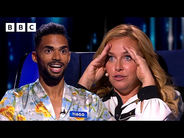 ⁣Josie Gibson helps Tiago answer the final question for £82,000 - BBC