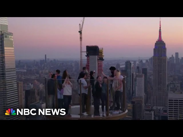 ⁣NBC News hosts ride Skylift, an attraction that takes you above Rockefeller Center