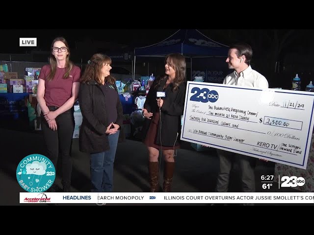 ⁣23ABC Community Baby Shower check presentation