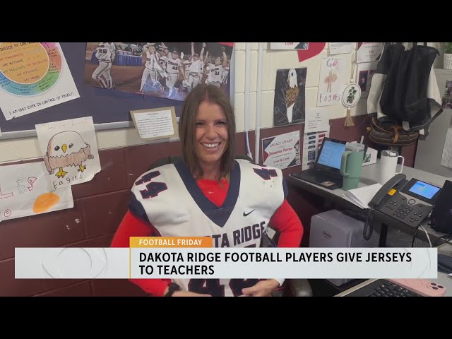 ⁣Football Friday: Dakota Ridge football players give jerseys to teachers