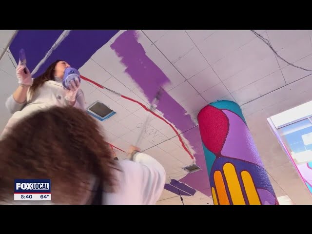 ⁣Art students paint mural to brighten TWU walkway