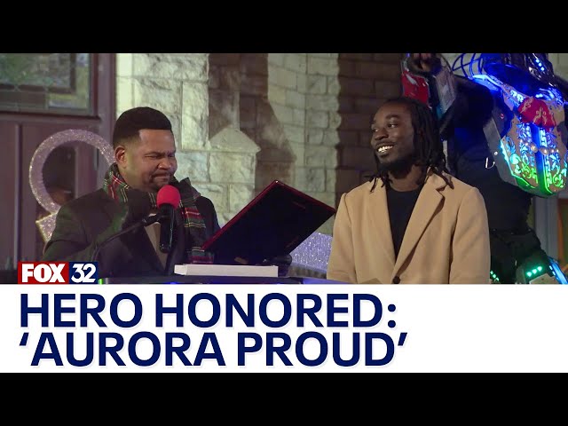 ⁣Local hero honored during Aurora's holiday festivities