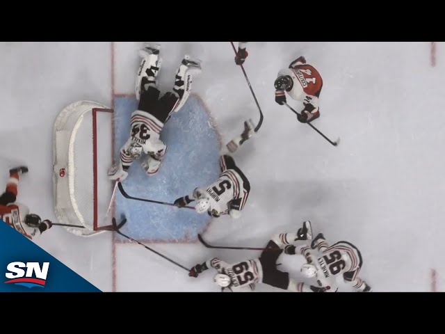 ⁣Blackhawks' Petr Mrázek Lays Out for Diving Stop on Flyers' Rasmus Ristolainen