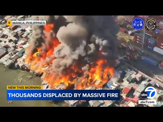 ⁣Huge fire engulfs residential compound in Manila