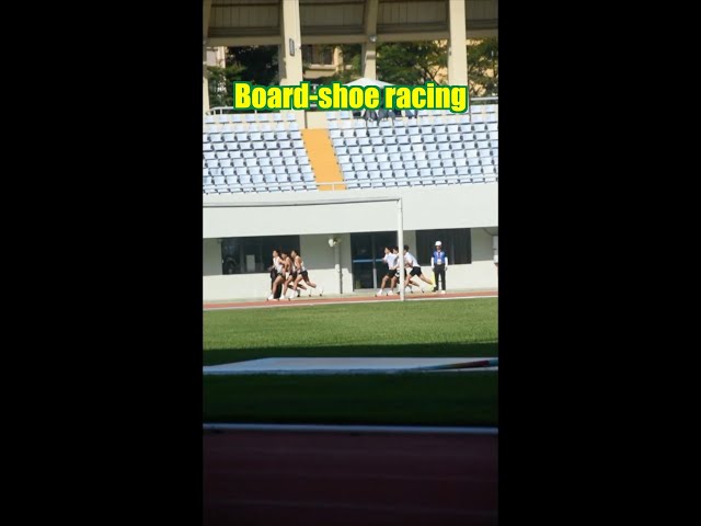 ⁣Board-shoe racing at sports event in China's Sanya