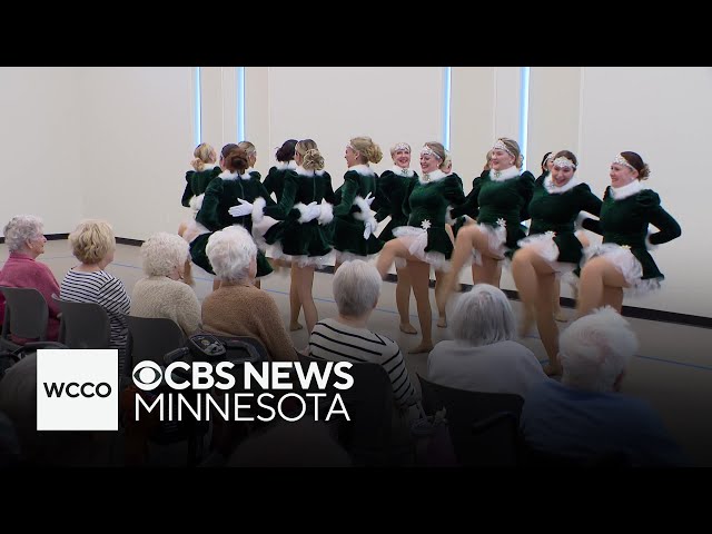 ⁣Volunteer kickline dances for Twin Cities seniors during the holiday season