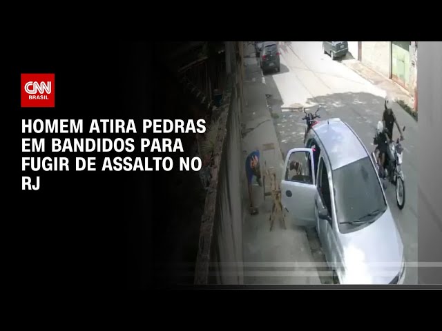 ⁣Homem atira pedras em bandido para fugir de assalto no RJ | LIVE CNN