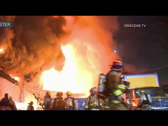 ⁣Large building fire prompts street closures in South LA