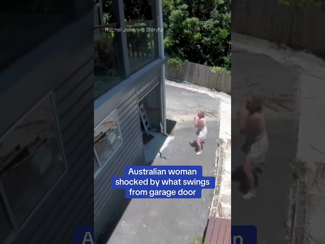 ⁣Australian woman shocked by what swings from garage door