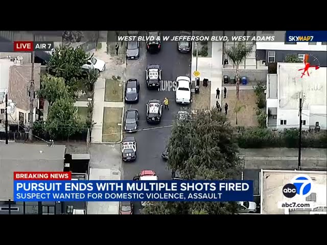 ⁣Police chase ends in gunfire in West Adams area; suspect, one other person injured