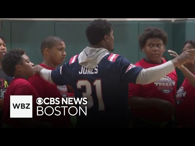 ⁣New England Patriots player hosts Turkey Bowl, community dinner in Dorchester