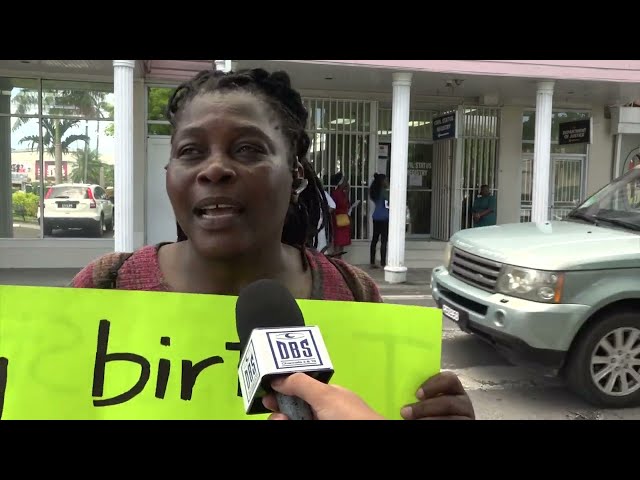 ⁣A Lone Castries Woman Protests Issues At The Civil Status Registry