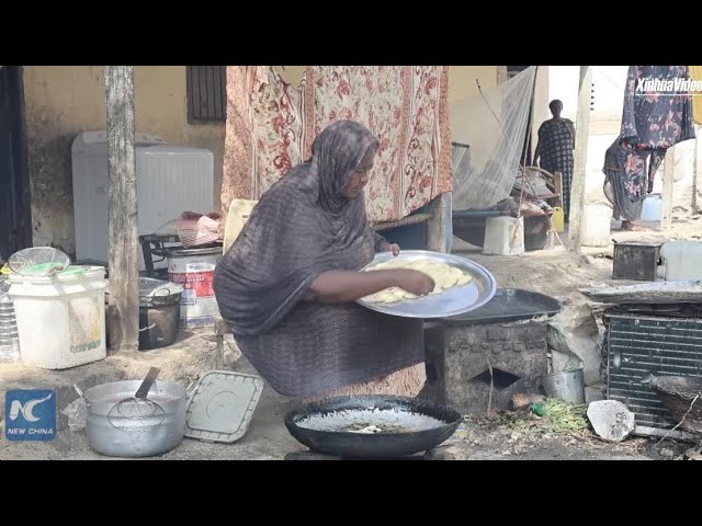 ⁣Women in war-torn Sudan earn living by making sweets