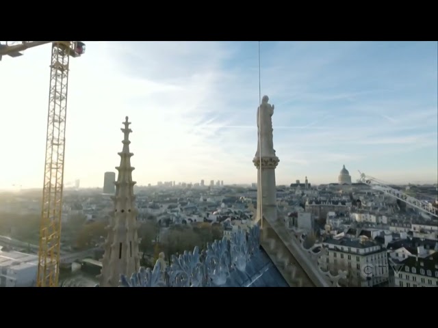 ⁣Drone view of restored Notre Dame Cathedral in Paris