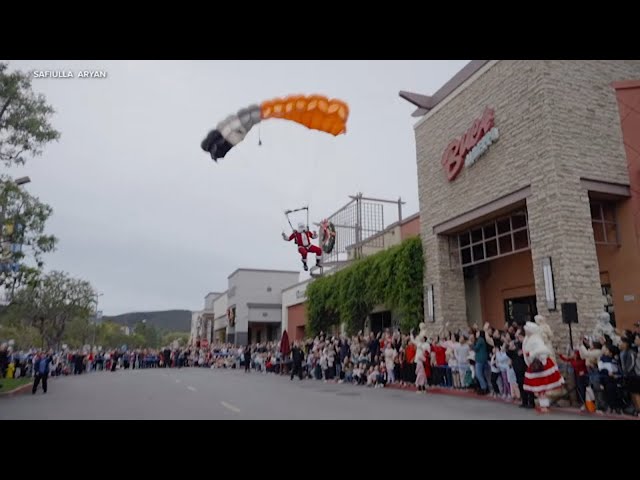 ⁣Santa Claus ditches sleigh, parachutes into town instead