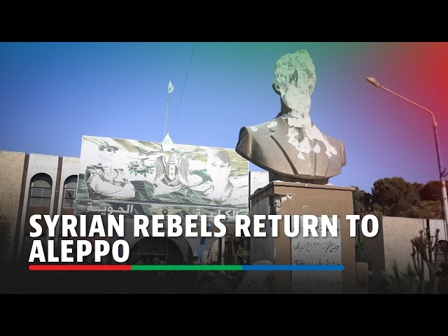 ⁣Syrian rebels inside Aleppo as residents survey damage