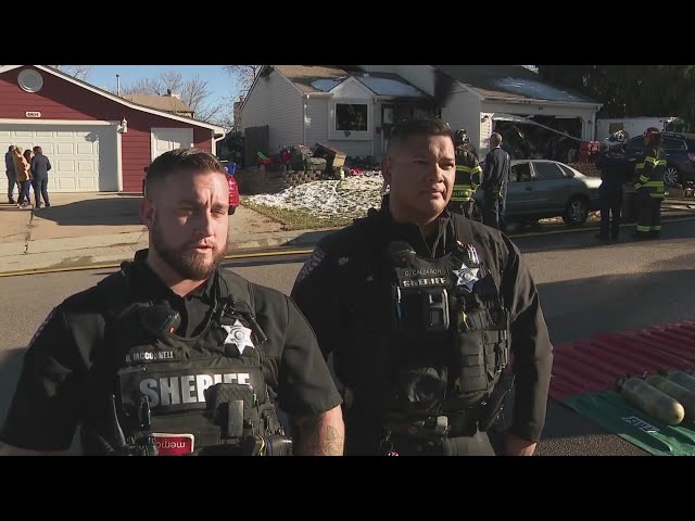 ⁣Arapahoe County deputies rescue 2 children from backyard of burning Centennial home