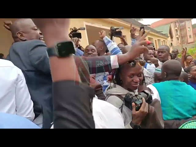 ⁣Supporters welcome Besigye at court martial