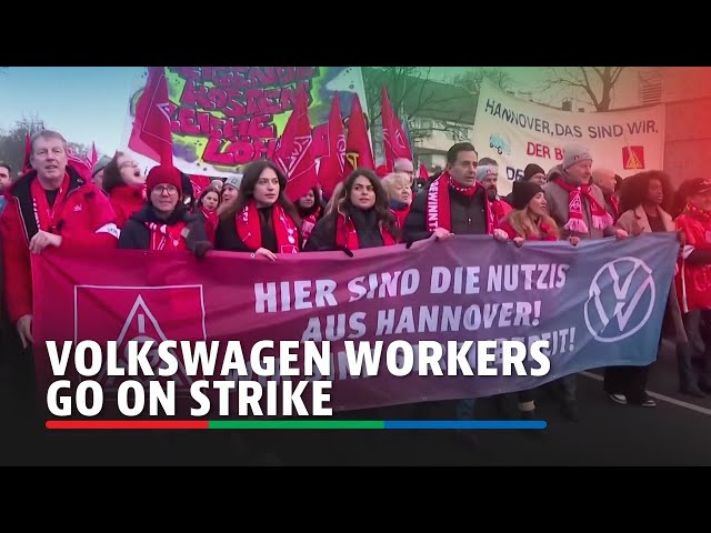 ⁣Faced with wage cuts and plant closures, angry VW workers across Germany go on strike | ABS-CBN News