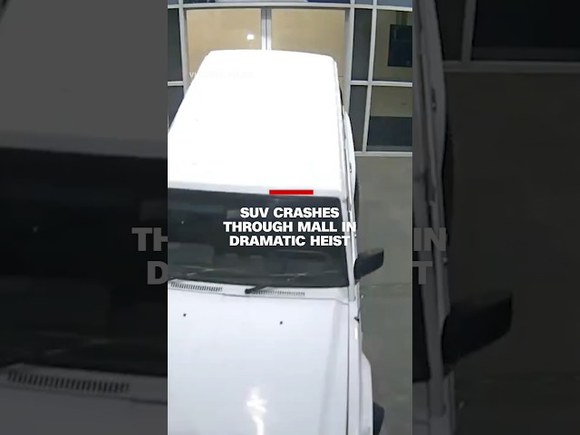 ⁣SUV crashes through mall in dramatic heist