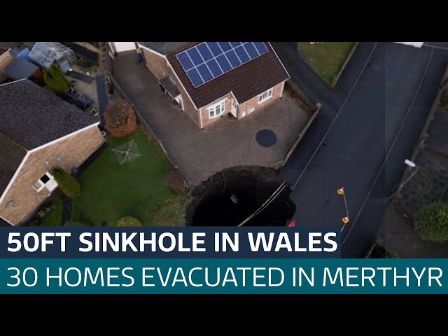 ⁣Huge 50ft sinkhole appears on Merthyr housing estate as homes evacuated| ITV News