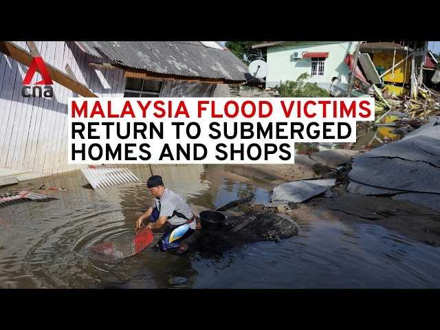 ⁣Malaysia floods: Clean-up begins as residents return