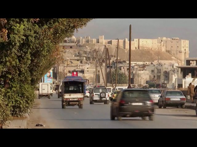 ⁣Syrian residents flee Aleppo as conflict escalates