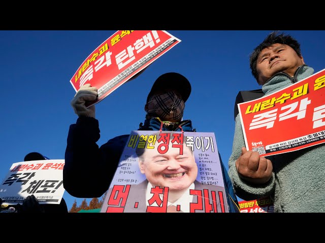 ⁣Calls for South Korean president to resign over martial law declaration