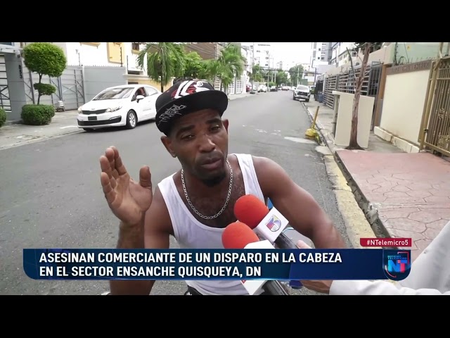 ⁣Investigan caso de colmadero muerto de un disparo frente a su negocio