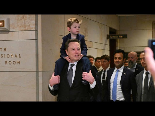 ⁣Elon Musk visits Capitol Hill carrying his son alongside Vivek Ramaswamy