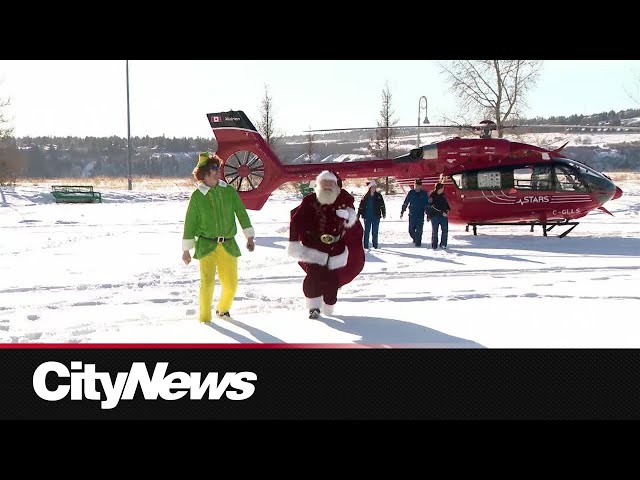 ⁣STARS Ambulance delivers Santa Claus to Alberta Children's Hospital