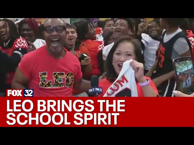 ⁣FOX 32's Joanie Lum gets surprised with jersey from Leo High School students