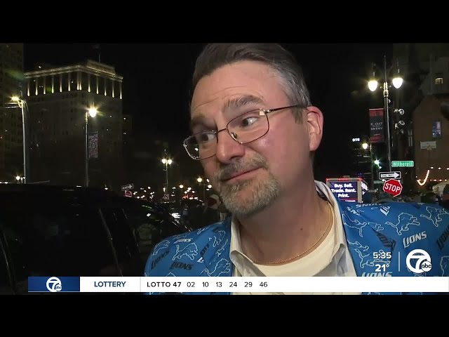 ⁣Detroit Lions fans celebrate after clinchign another playoff spot