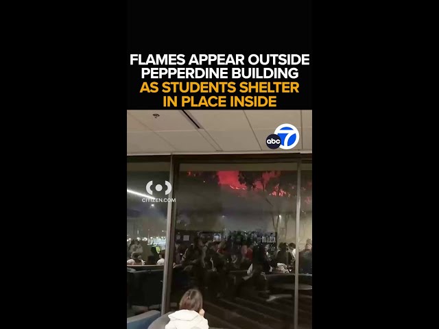 ⁣Video from inside Pepperdine library shows flames from wildfire