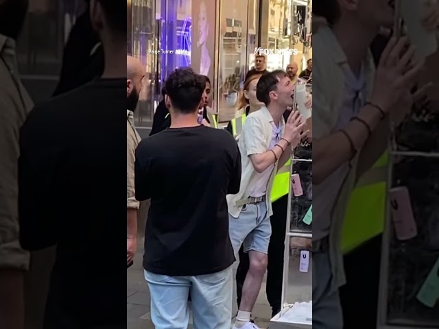 ⁣Man gets tongue stuck on ice block at mall