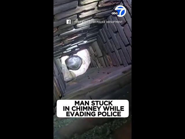 ⁣Man stuck in chimney while evading police