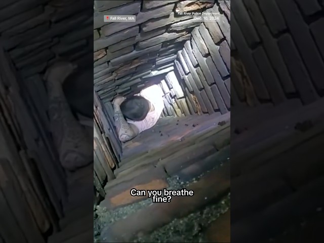 ⁣Man gets stuck in chimney while evading police