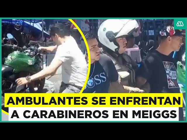 ⁣Videos muestran agresión de ambulantes a Carabineros en Meiggs