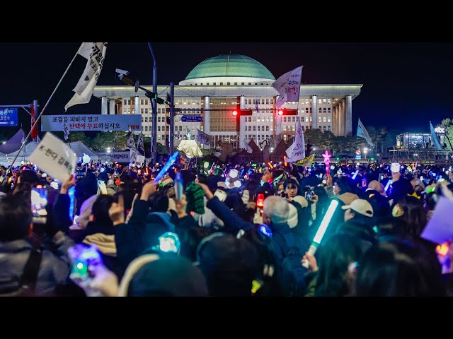 ⁣‘Mass jubilation’ outside South Korea’s parliament after president impeached