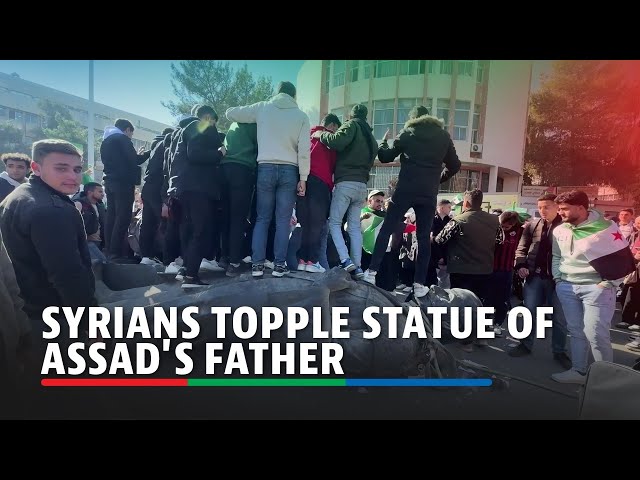 ⁣Syrians topple statue of Assad's father, Hafez | ABS-CBN News