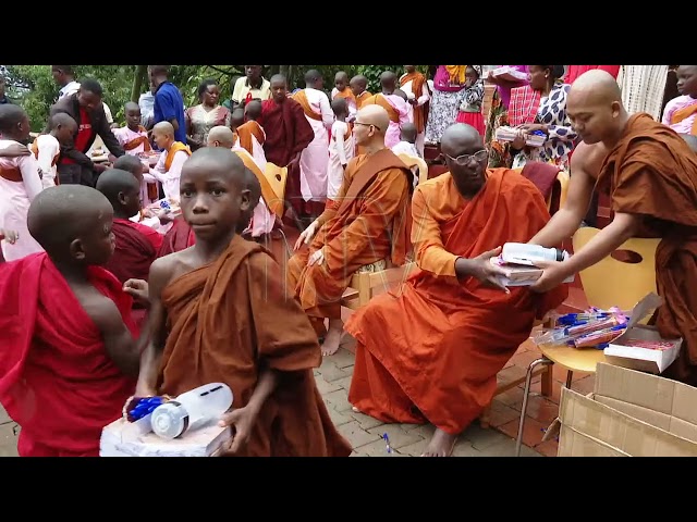 ⁣Buddhist event in Entebbe ends with school supplies