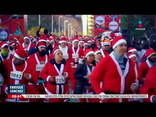 ⁣Miles corren vestidos como Santa Claus participaron en la CDMX