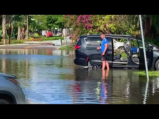 ⁣Heavy rain floods Broward streets, homes and businesses