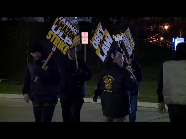 ⁣Amazon workers in Detroit picket outside of warehouse; picketer bumped by truck