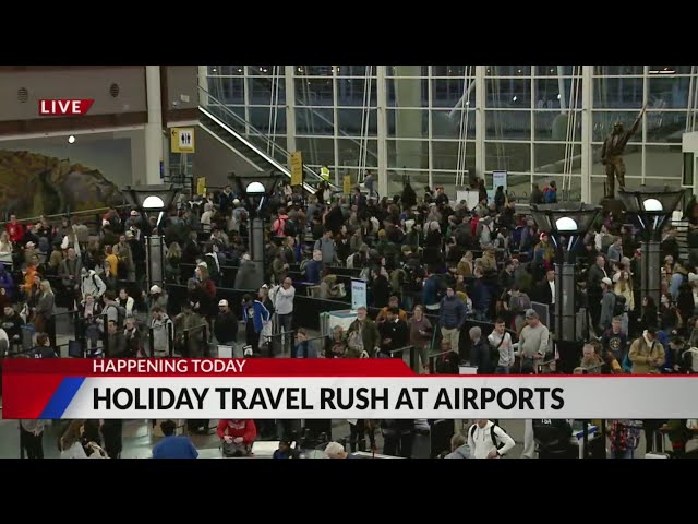 ⁣Holiday travel rush begins at DIA