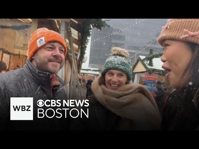 ⁣Boston's holiday shoppers refuse to let snow slow them down