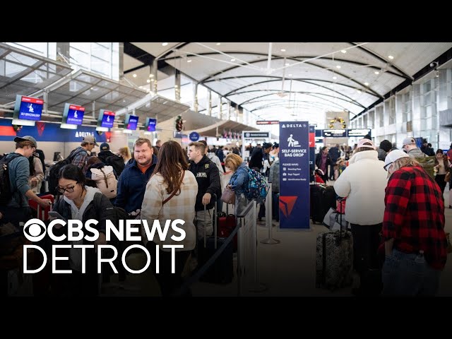 ⁣Detroit airport travelers determined to reach holiday destinations amid delays