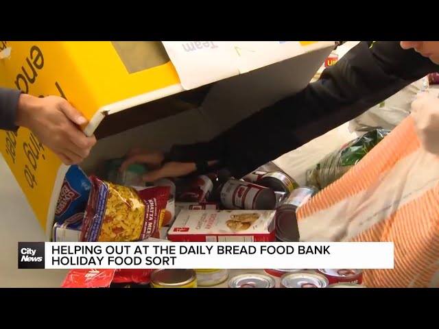 ⁣Helping out at the Daily Bread Food Bank Holiday Food Sort