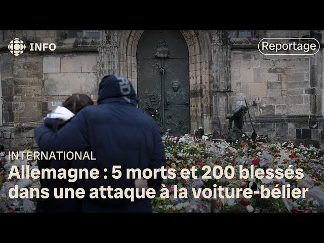 ⁣Les Allemands encore sous le choc au lendemain de l’attaque dans un marché de Noël