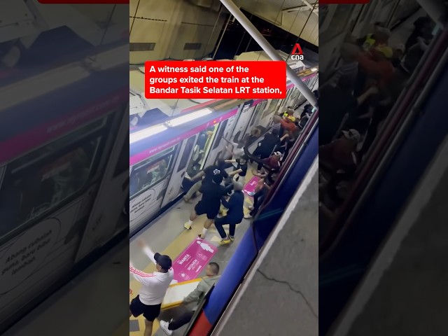 ⁣Fight breaks out between football fans at Malaysia LRT station